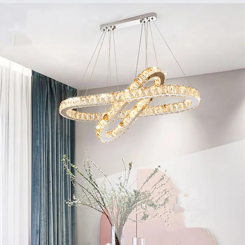 lampadario moderno in acciaio inox con cristallo e illuminazione led