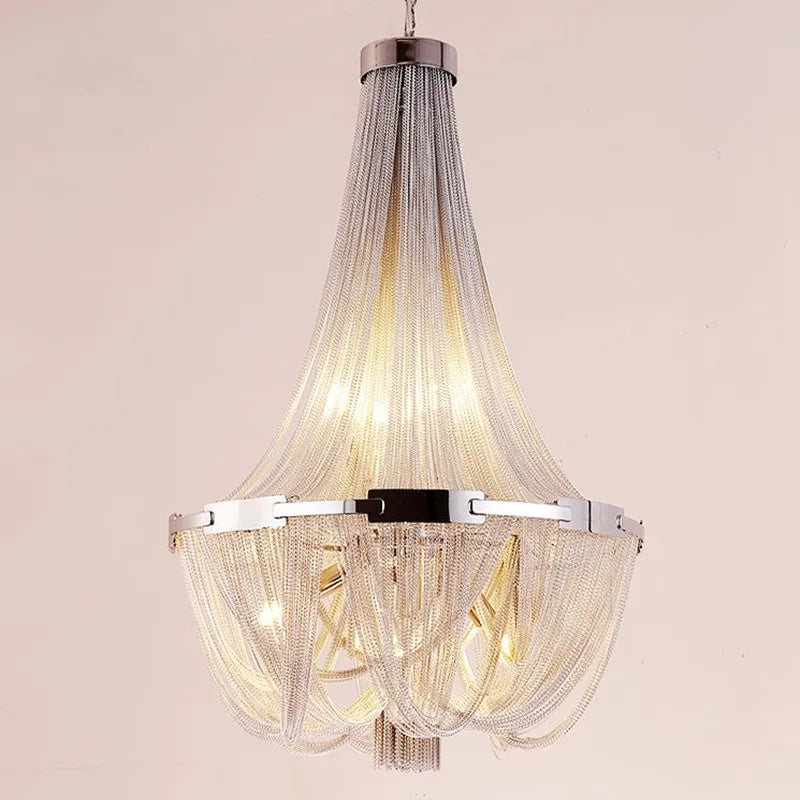lampadario sospeso con pon pon in alluminio argentato con illuminazione led