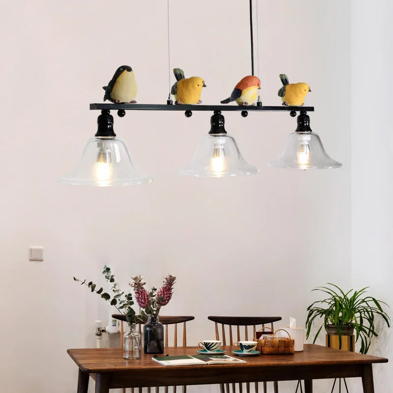lampadario nordico in ferro, vetro e resina con uccelli