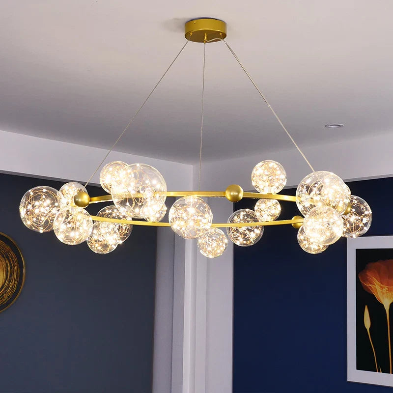 lampadario moderno di lusso con anelli led e sfera di vetro