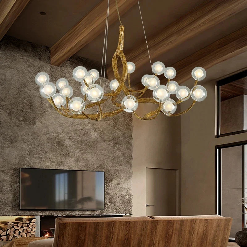 lampadario nordico in resina imitazione ramo con sfera di vetro