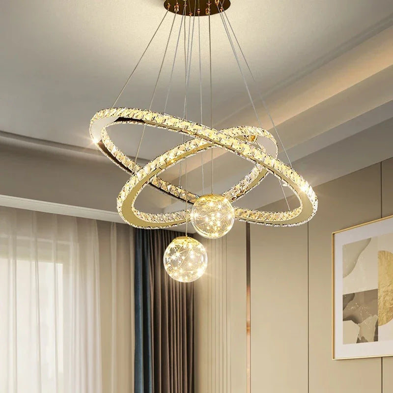 lampadario moderno in cristallo a led con finitura dorata a stella