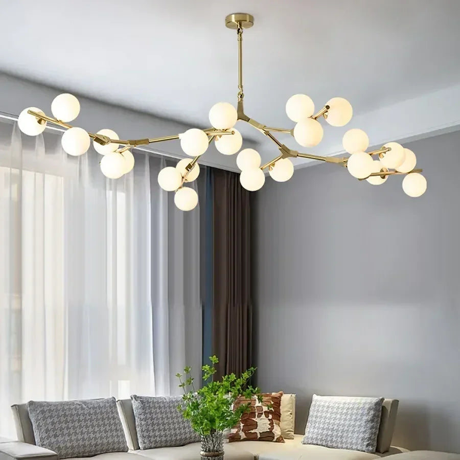 lampadario moderno in vetro con rami led sospesi