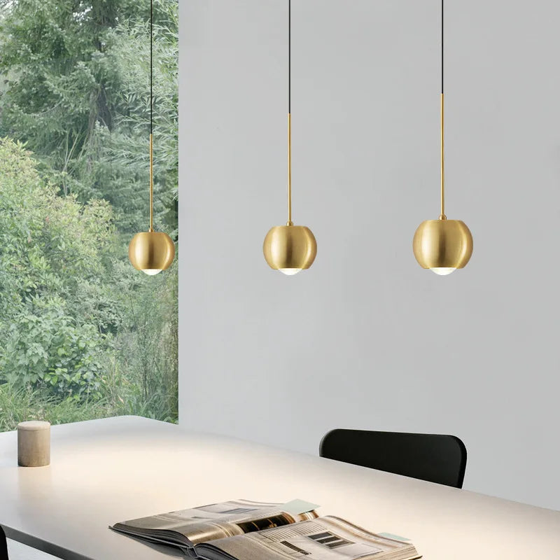 lampadario in rame semplice proiettore sospeso atmosfera luminosa