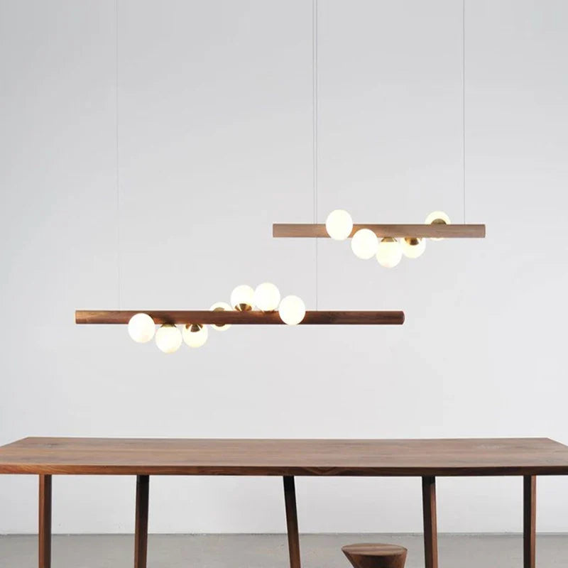 lampadario moderno in vetro e legno di noce per interni