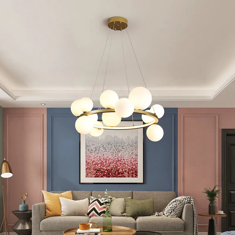 Lampadario design rotondo con sfere in vetro trasparente a LED
