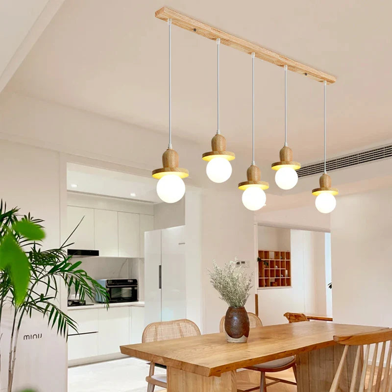 lampadario in legno massiccio stile nordico con tre teste