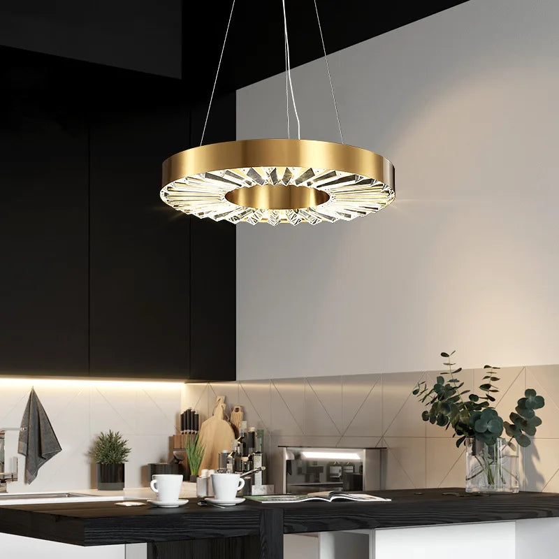 Lampadario in cristallo design moderno in acciaio inox dorato sospeso