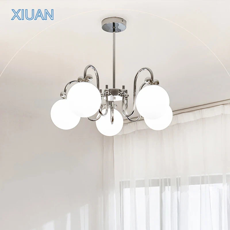 lampadario moderno in cromo con sospensione in vetro